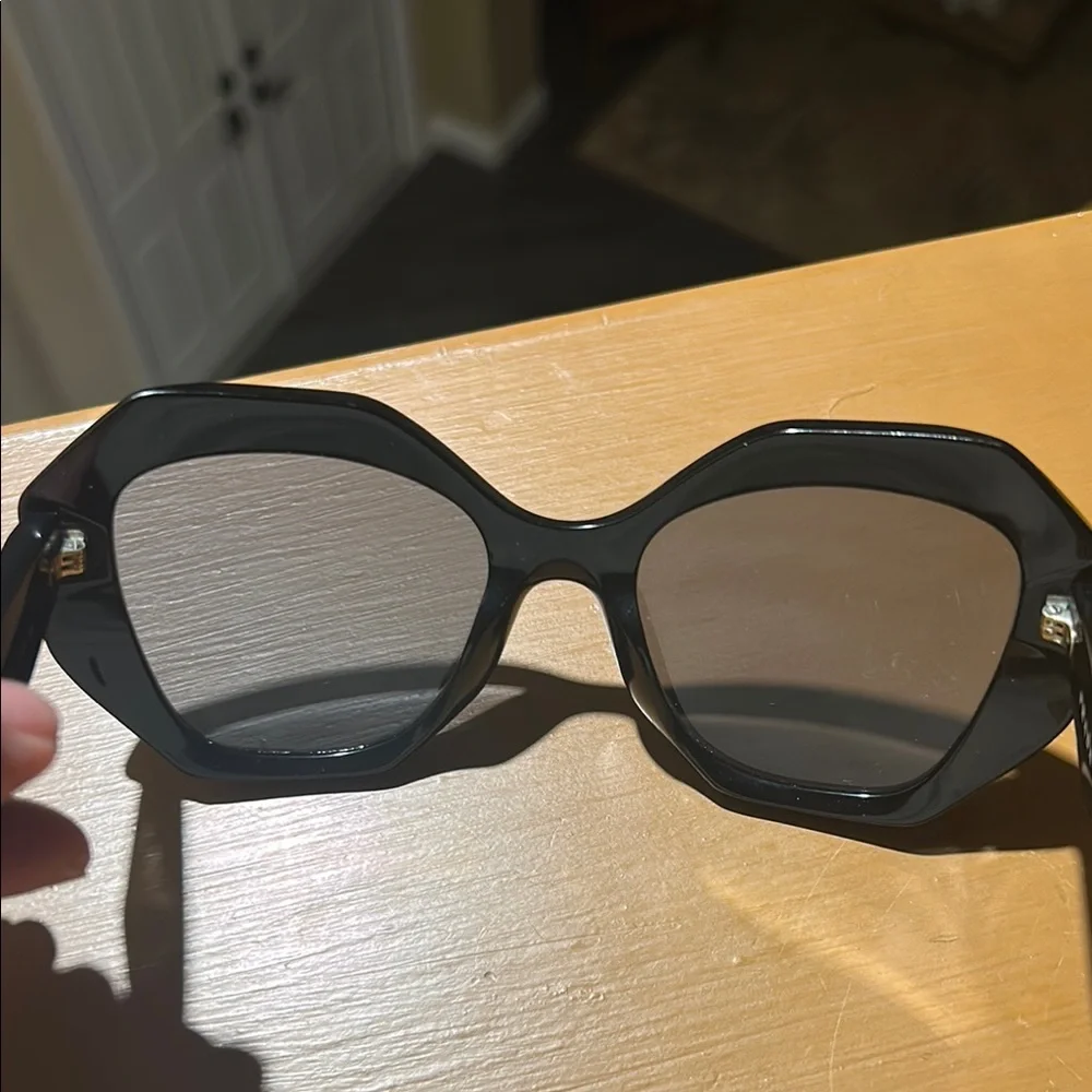 Prada these glasses